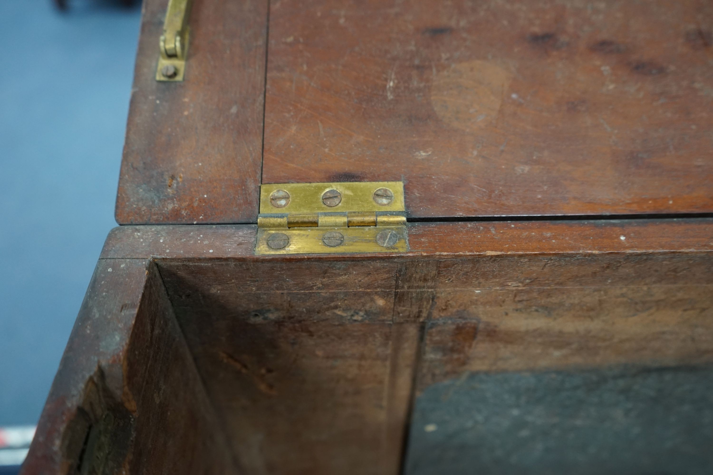 A 19th century brass-bound teak campaign trunk, having hinged top and side mounted carrying handles, width 55cm, depth 43cm, height 44cm